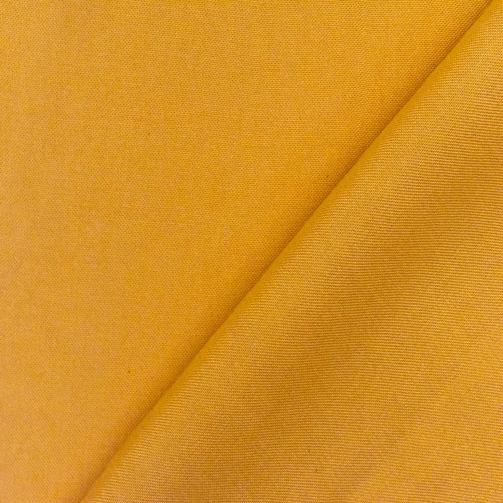 Earth Yellow Famous Designer Solid Rayon Challis Woven Fabric