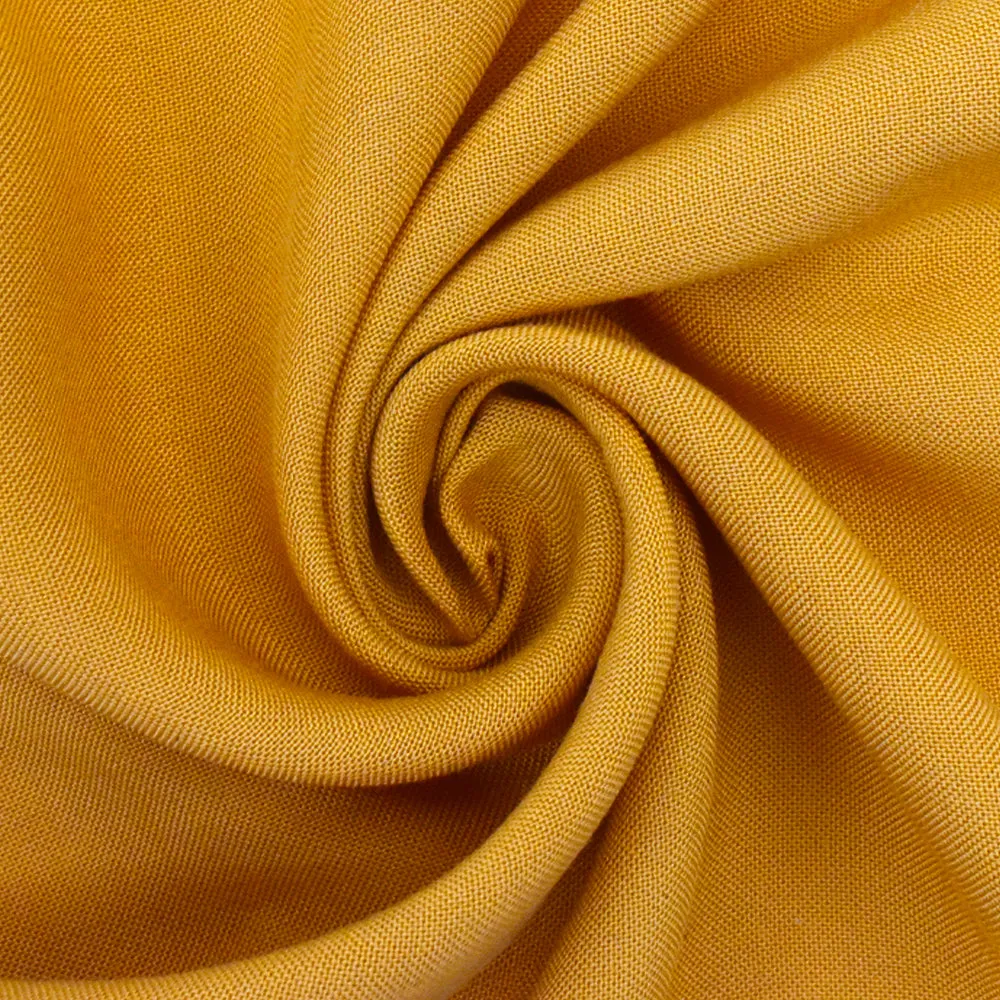 Earth Yellow Famous Designer Solid Rayon Challis Woven Fabric