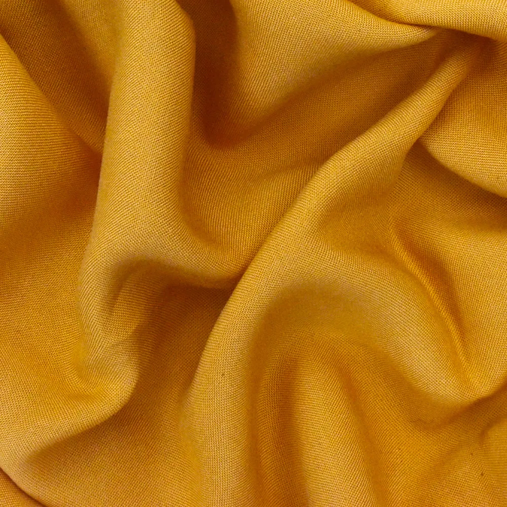 Earth Yellow Famous Designer Solid Rayon Challis Woven Fabric